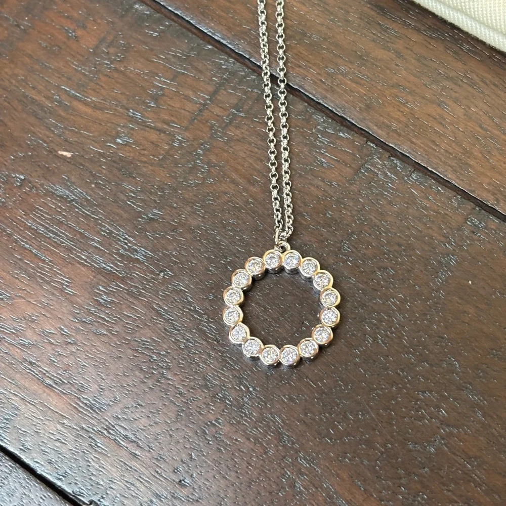 Kate Spade Full Circle Necklace Silver Colored with Clear Stones New with pouch‎
